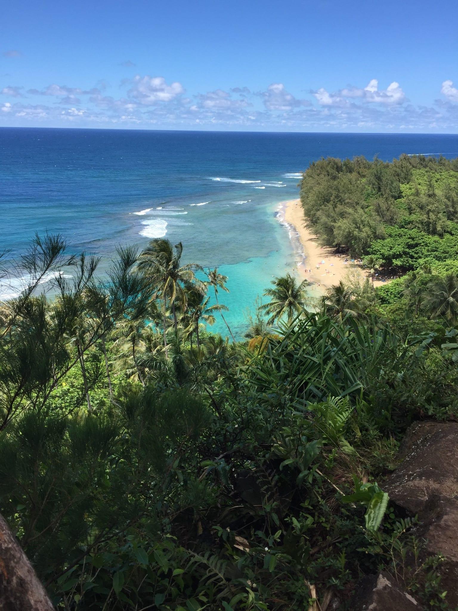 Ke'e Beach turquoise lagoon viewed from above, a scenic North Shore beach reached by driving west from Princeville