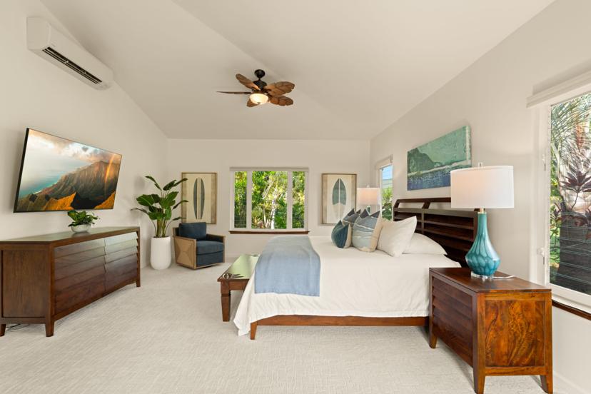 Master suite with Na Pali Coast art, central AC, and king bed, Princeville rental