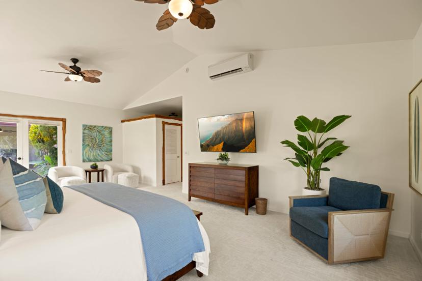 Master suite with king bed, AC, and lounge chair, Princeville Kauai