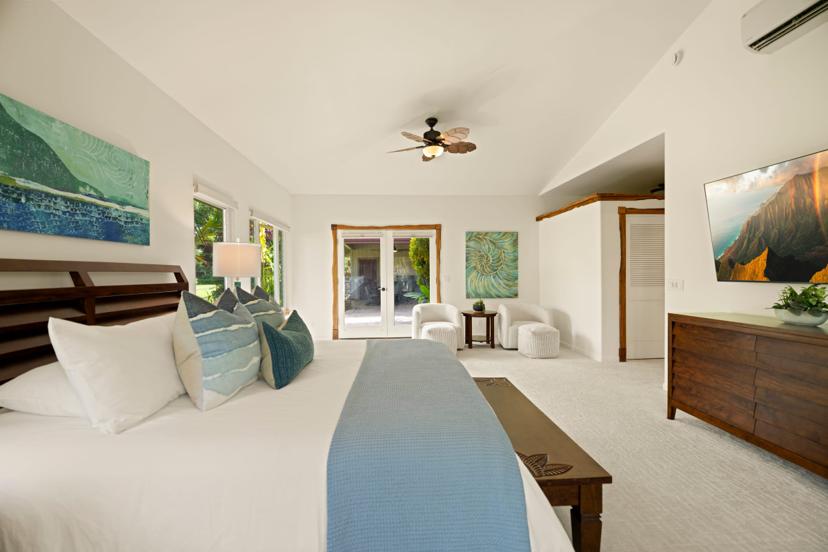 Master bedroom from foot of bed with garden-view French doors at Hale