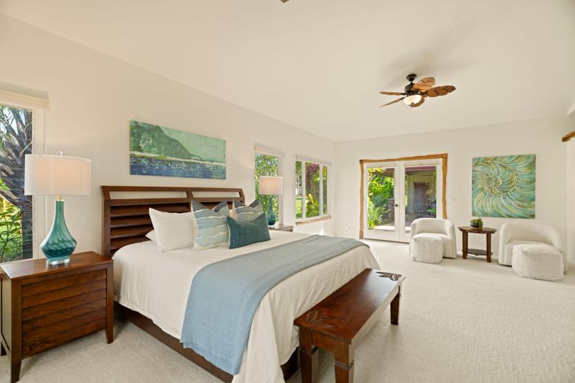 Primary bedroom with king bed and twin reading lamps, Emmalani Hale