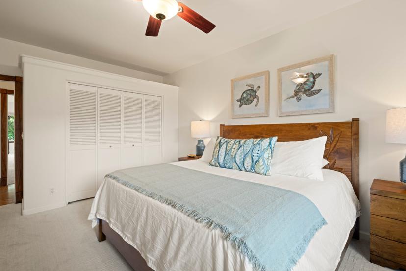 Guest bedroom with king bed and louvered closet, Princeville vacation rental