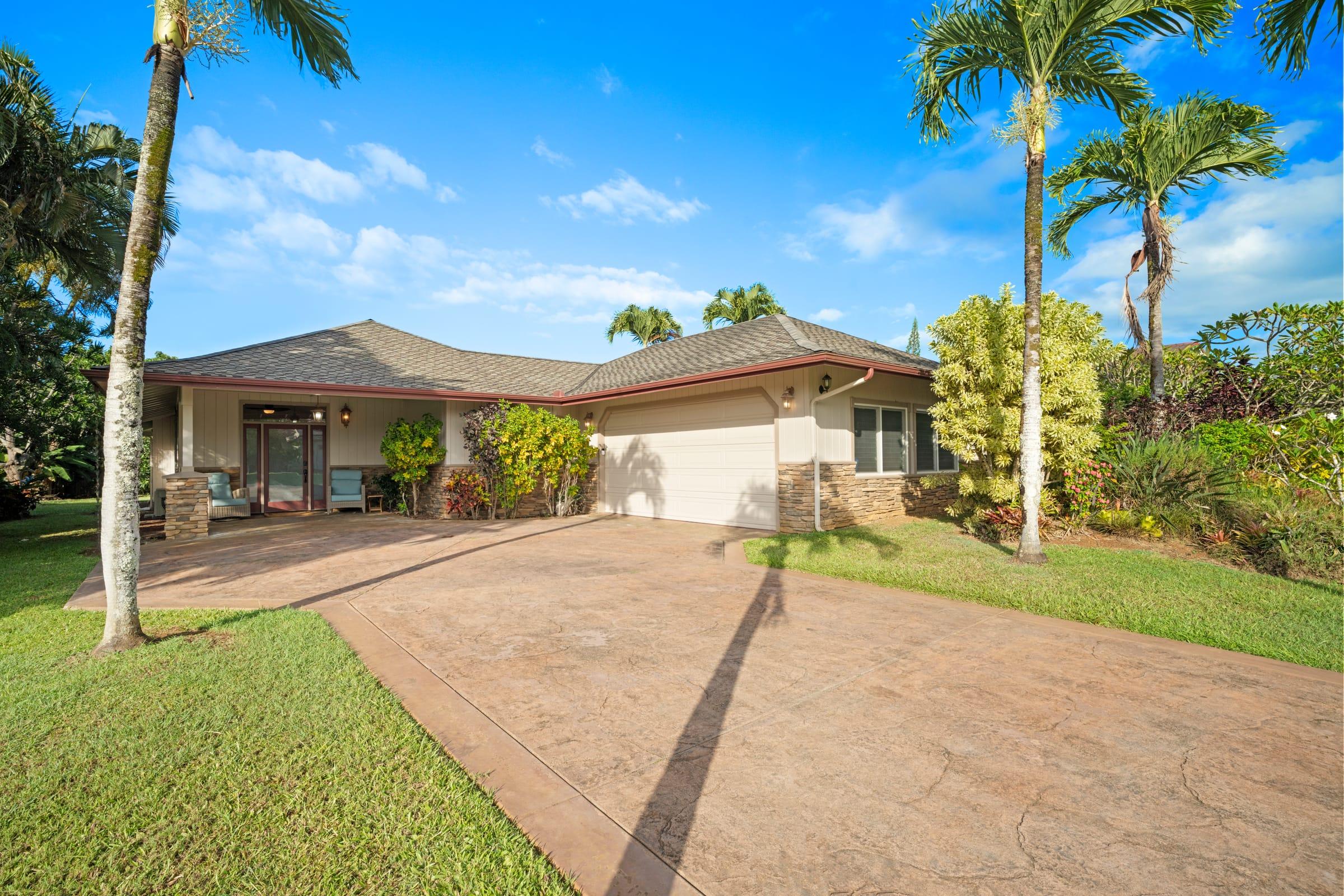 Front exterior of Emmalani Hale, a single-story luxury villa in Princeville, Kauai