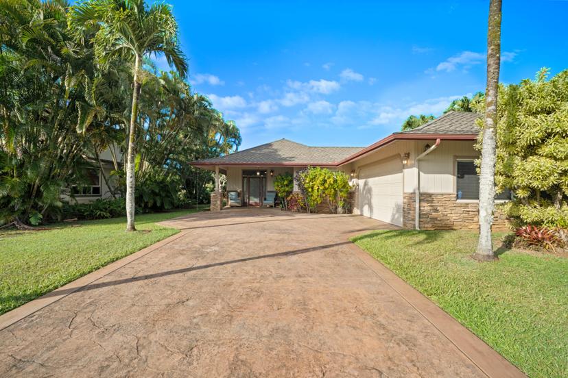 Stamped concrete driveway and front view of Princeville Kauai vacation rental