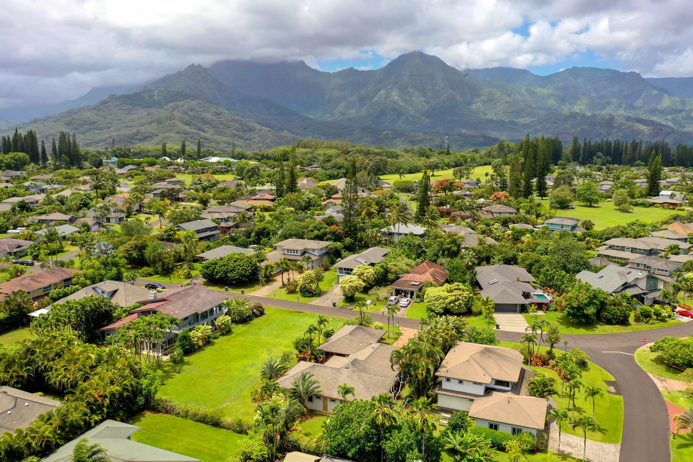 Aerial view of Princeville on Kauai's North Shore, with the bluff-top neighborhood and ocean beyond